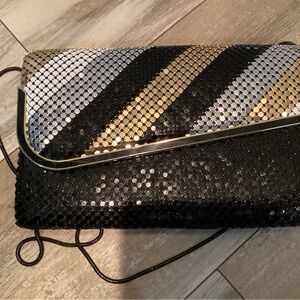 Elegant Black and Gold Clutch Bag